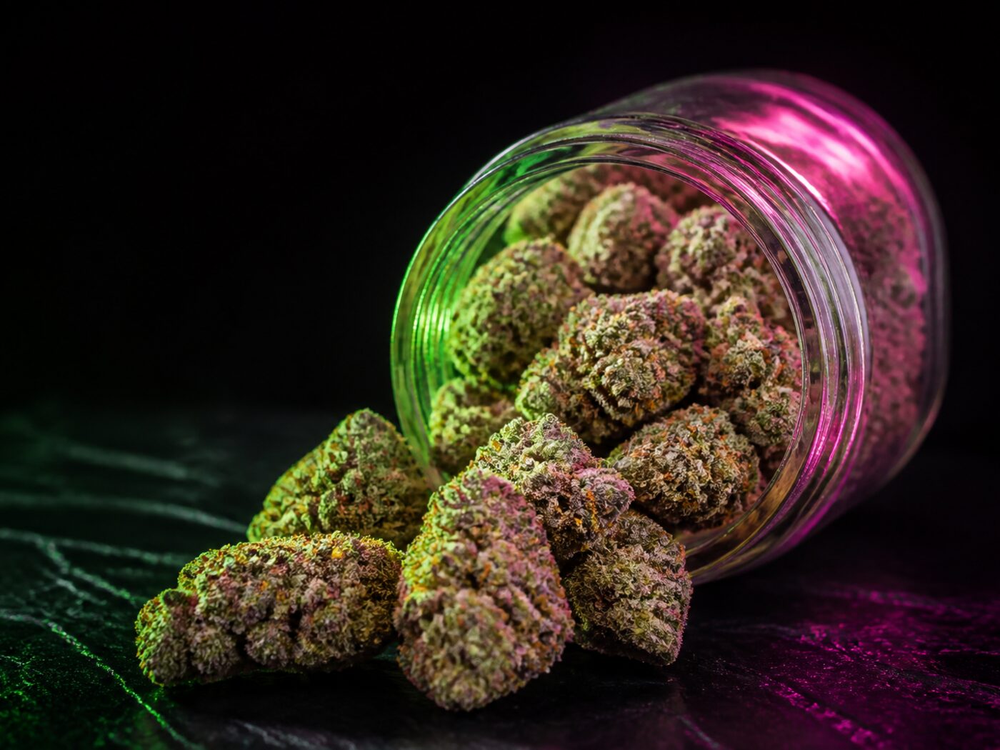 Studio catalog shot of dense flower in a glass jar